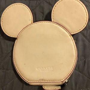I am selling a Mickey mouse change pouch.